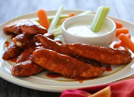 Quick and easy – these buffalo chicken strips are spicy and delicious! I like to serve them with my homemade skinny blue cheese dressing and celery sticks on the side for a hot and spicy appetizer.