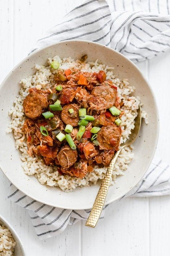 This New Orleans-inspired slow-cooker dish with chicken and Andouille sausage simmered in a rich tomato broth, is perfect to make for Fat Tuesday!