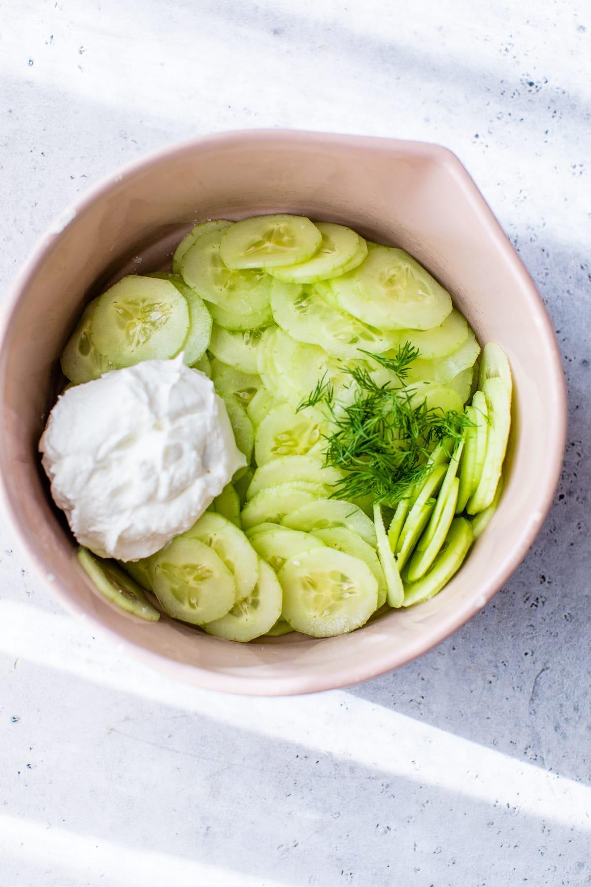 sliced cucumbers with yogurt