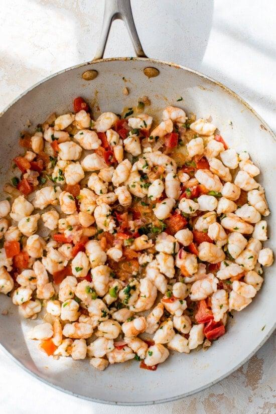 sauteed shrimp in a skillet