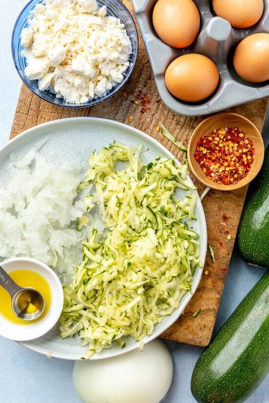 shredded zucchini, onions, eggs and feta