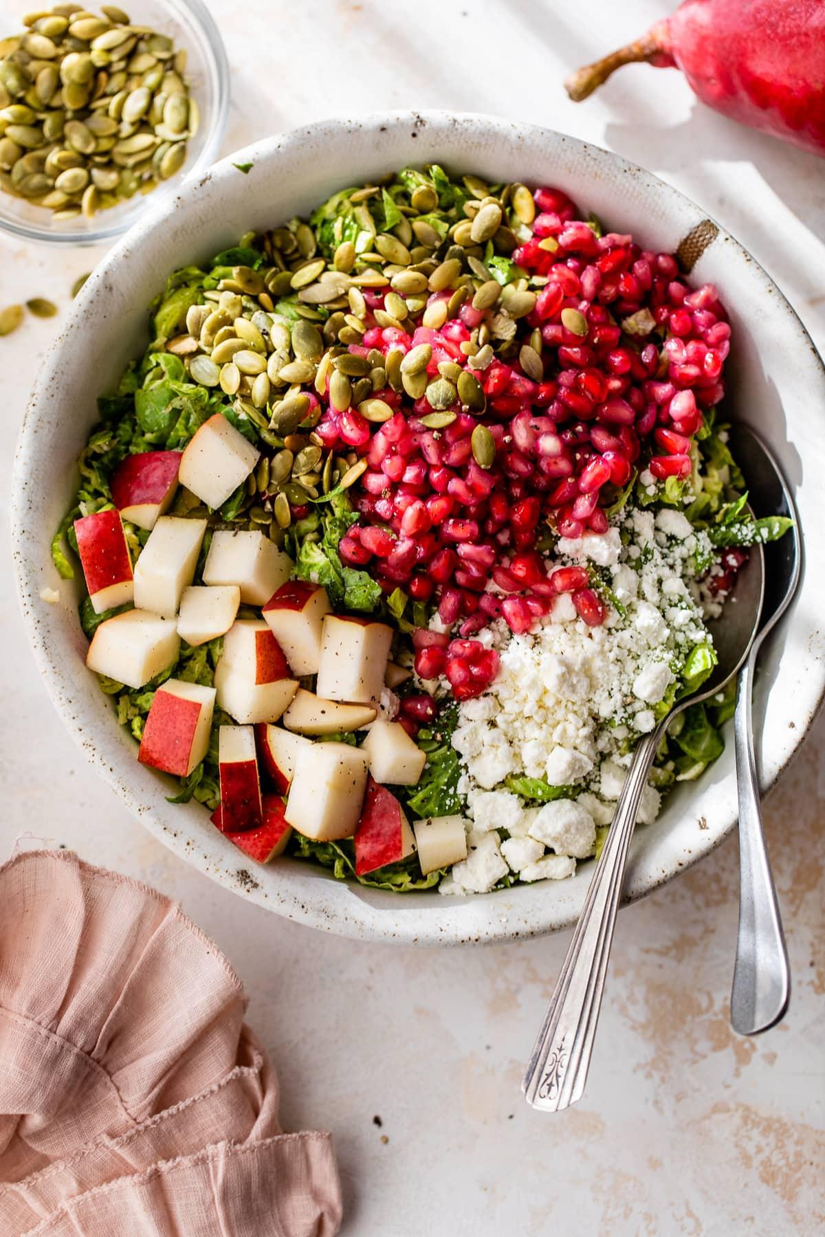 Shaved Brussels Sprouts Salad with Pears, Pomegranate and Pepitas