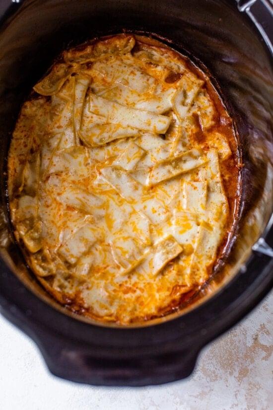 slow cooker with enchilada ingredients