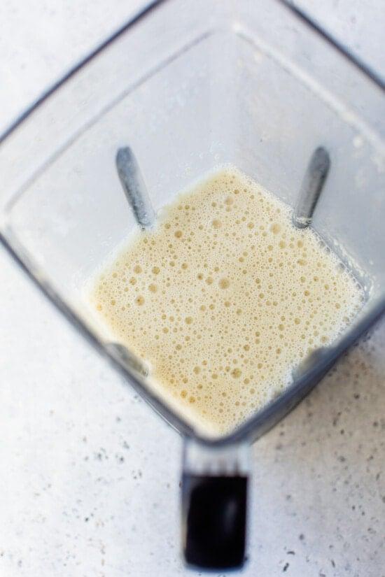 flour in blender with broth