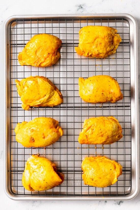 chicken thighs on a wire rack