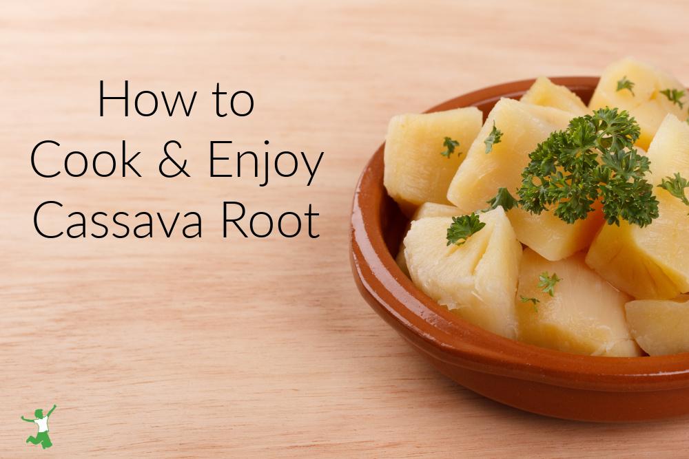 cooked cassava in a clay bowl with parsley sprig