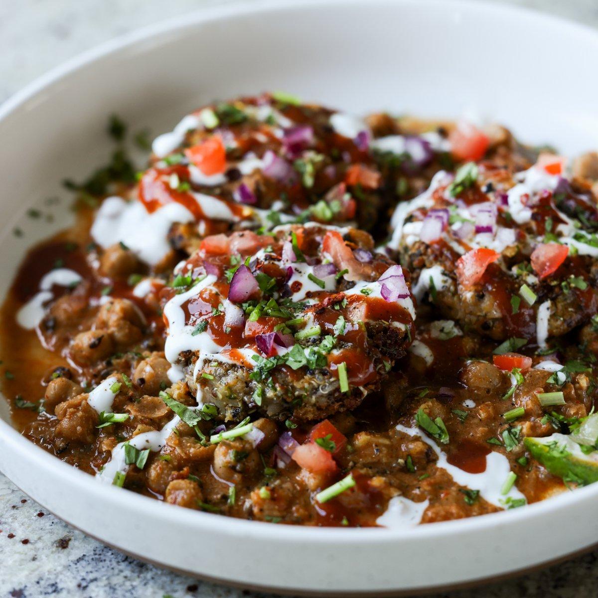 tikki chole in a bowl after adding toppings