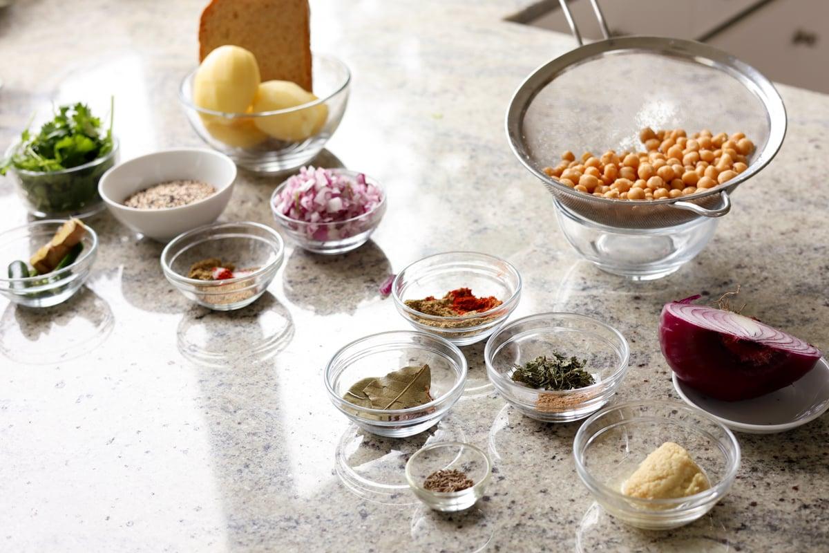 tikki chole ingredients on the kitchen counter