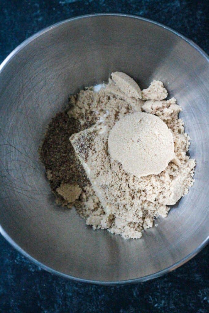 Butter and sugar in the bowl of an electric mixer.