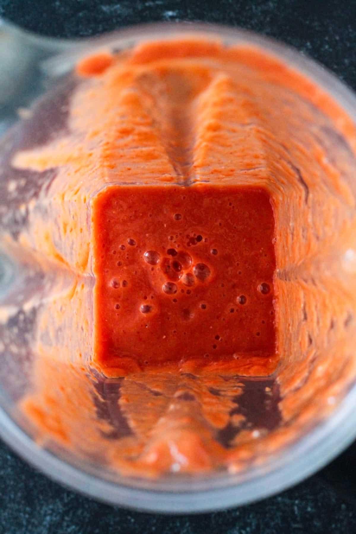 Chipotle tomato sauce in a blender.